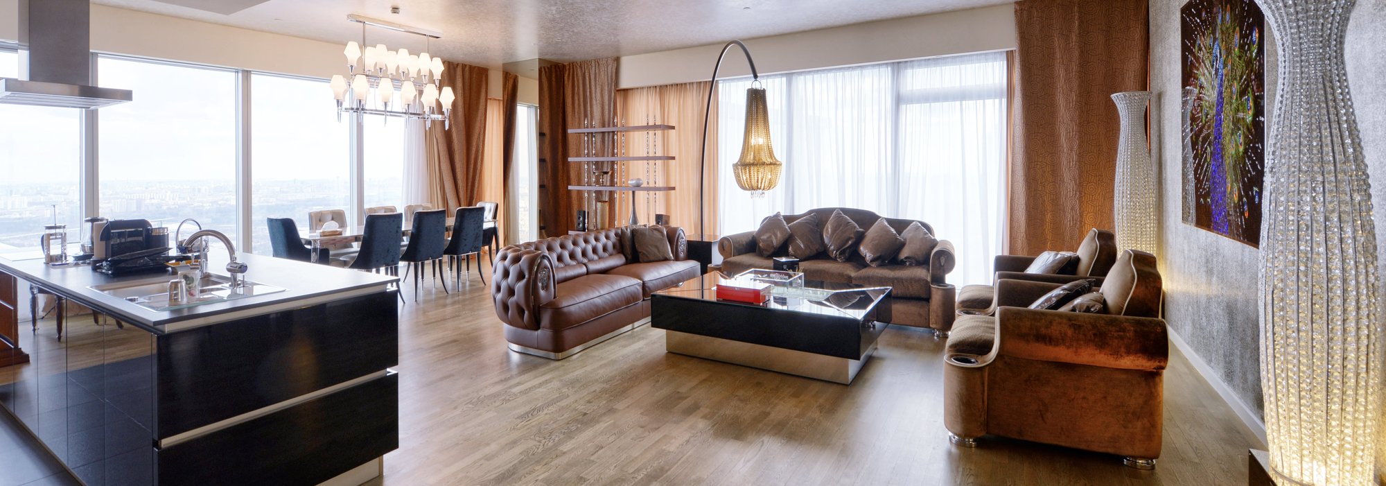 brown leather sofa on a brown hardwood floor from The Carpet Shoppe in Steamboat Springs, CO