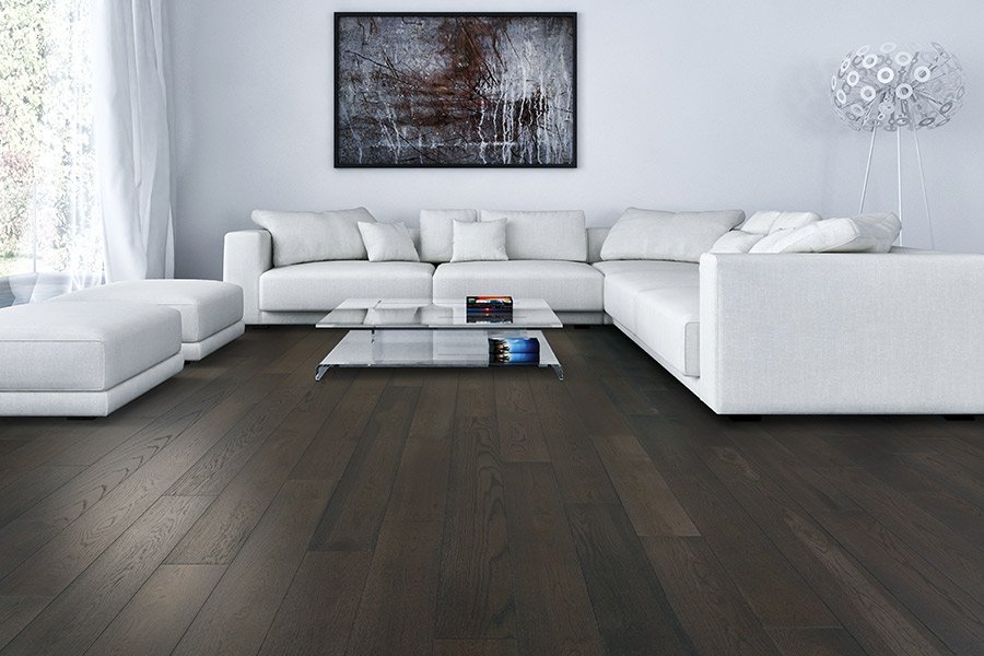 white sofa on a brown hardwood floors from The Carpet Shoppe in Steamboat Springs, CO